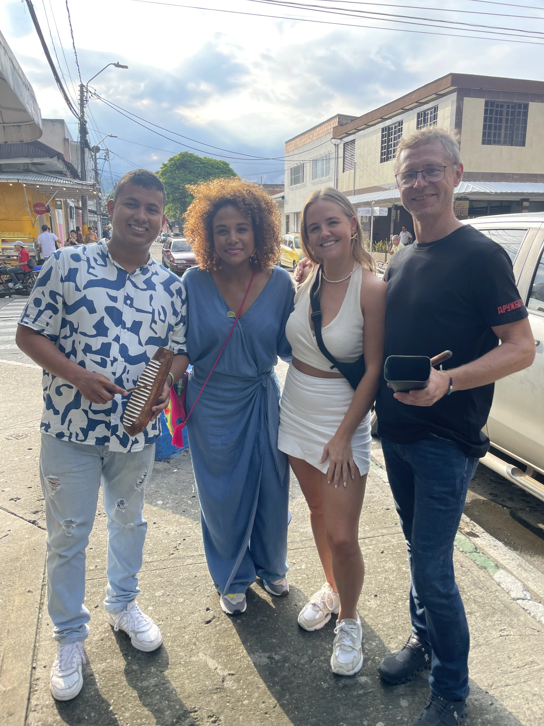 Group walking through Cali during Feria de Cali 2024.