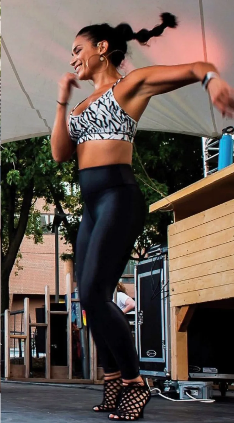 Yelitza Garcia dancing on stage.